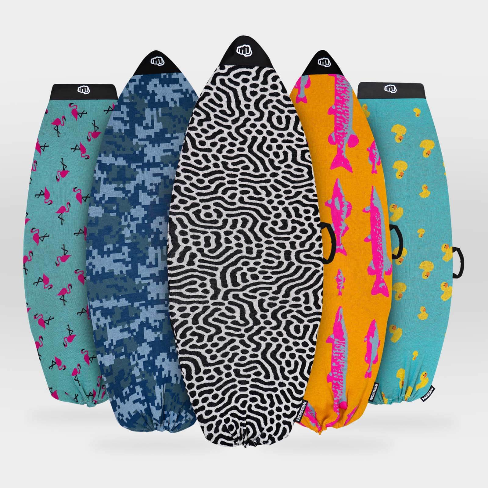 Five surfboard covers arranged in a fan shape against a light gray background. The covers feature different patterns and colors: teal with pink flamingos, blue digital camouflage, black and white zebra print, bright orange with pink fish, and teal with yellow ducks.